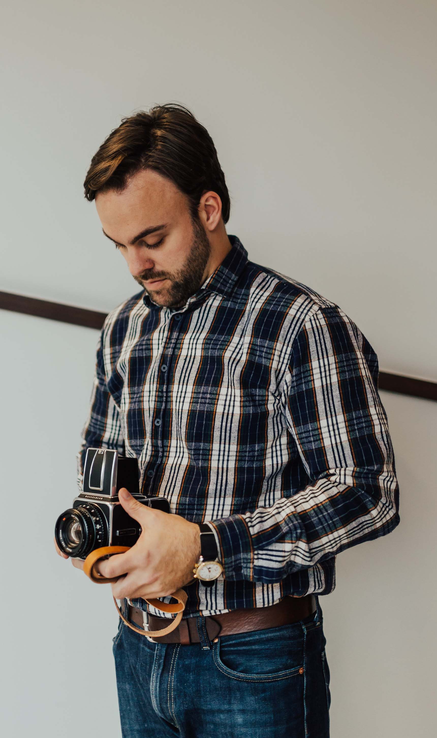 Casey Stanton holding a Hasselblad